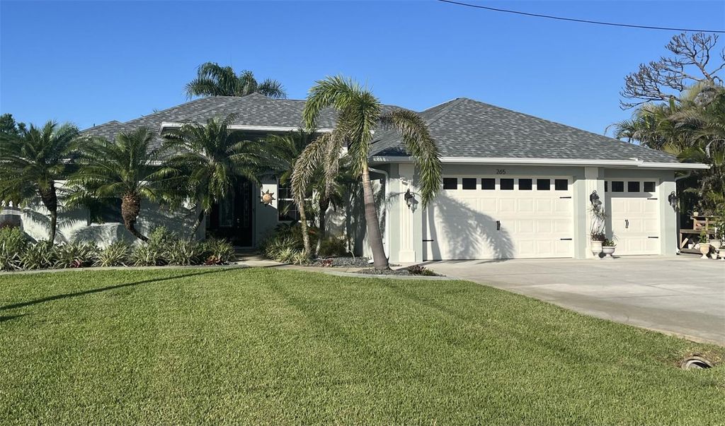 Photo of 265 White Marsh Lane, Rotonda West, FL 33947 (MLS # A4668893)