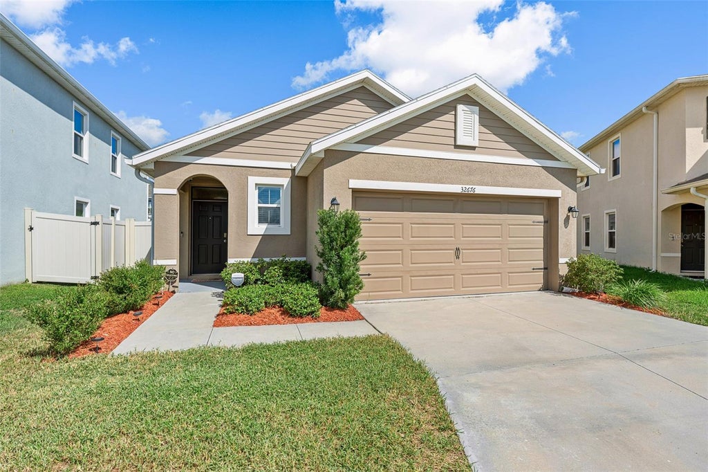 Photo of 32676 Canyonlands Drive, Wesley Chapel, FL 33543 (MLS # TB8559138)