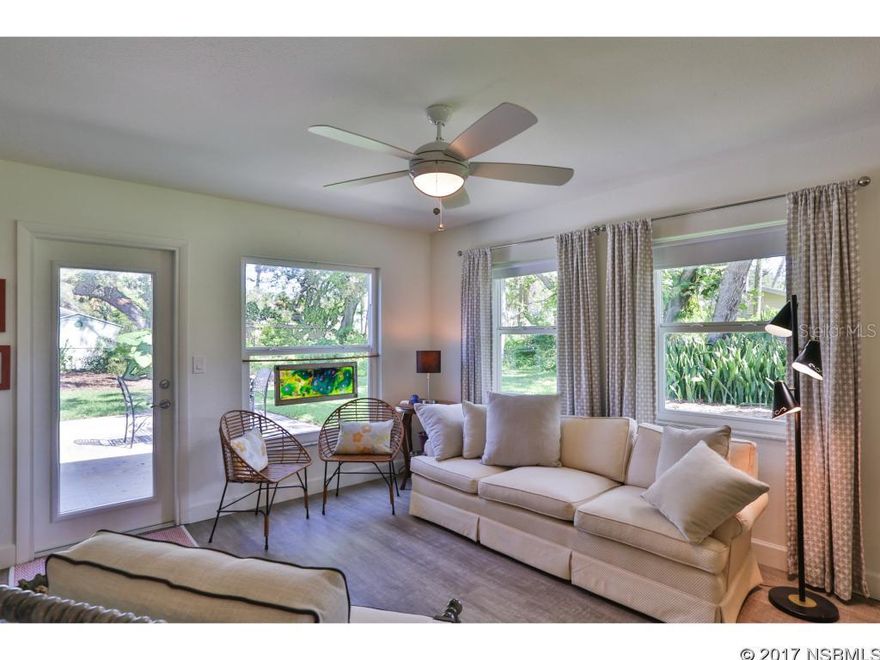 This home is at the Heart of the Beachside Lifestyle Experience and is just a short walk to downtown, sound, and ocean.  Don't be fooled by a quick glance of this home.  This homes sits on the westerly 50 feet of the 100 foot wide lot!  This lot has the most beautiful Oak Trees and landscaping.  Room to add your guest quarters, pool house, oversized pool and 2 car garage!  Let your imagination run wild!  This home is a sleeper if you don't look closely at what is being offered for sale.  COMPLETE RENOVATION in 2016.  Solid Concrete Block Construction and a new metal roof provide peace of mind while enjoying your beachside living. Imagine sitting under the Cool Canopy of the numerous Historic Oak Trees that dot this 100 x 150 Property.  Live the Beachside Lifestyle in this 2 Bedroom 3 Bath with NEW EVERYTHING including Large OPEN CONCEPT CHEFS KITCHEN which blends seamlessly with the Entertainment and Sitting Areas. The Italian made microwave/convection wall ovens as well as a built-in refrigerator and a cooktop highlight this kitchen that is brimming with white cabinets.  The Master Bedroom is large enough for a King Bed with room to spare and has an en-suite bathroom.  The Second Bedroom is nicely sized with its own separate Full-Size Bathroom.  The Separate Laundry Room includes a full bathroom as well. All windows are NEW HURRICANE IMPACT grade windows.  The one car garage is oversized and includes storage/work bench space. Step through the full-lite glass rear door onto the oversized patio for a quiet retreat under the live oaks. The beautiful yard is spacious and offers plenty of opportunities for a pool, carriage house or home expansion. This centrally located Beach House offers a Multitude of brand new Features and is a must see if you are looking to live the Beachside Lifestyle. Room measurements are guestimated; buyer to measure rooms. ;Water: City