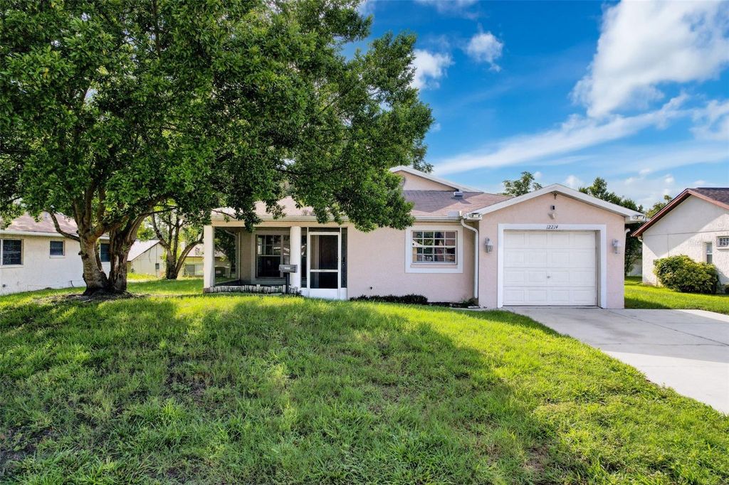 Photo of 12214 Partridge Hill Row, Hudson, FL 34667 (MLS # W7877136)