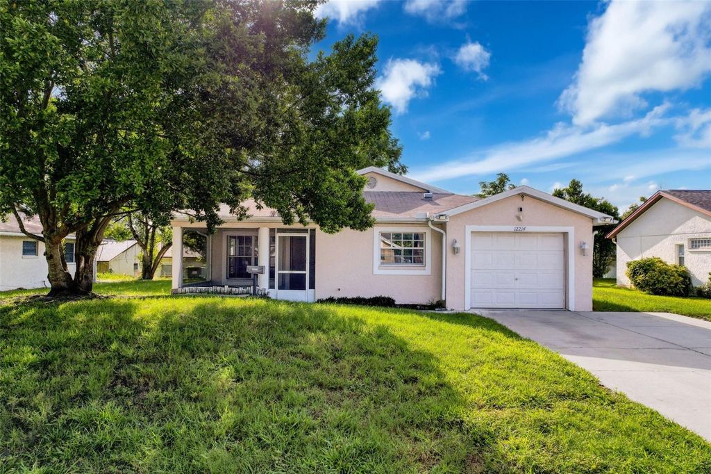 Photo of 12214 Partridge Hill Row, Hudson, FL 34667 (MLS # W7877136)