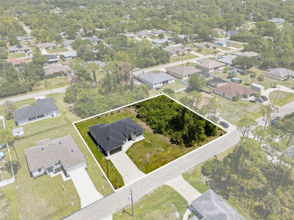 Photo of 3728 Markle Avenue, North Port, FL 34286 (MLS # TB8496081)