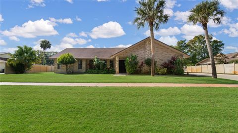 Photo of 965 Pelican Bay Drive, Daytona Beach, FL 32119 (MLS # O6359548)