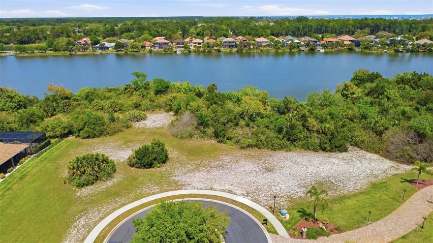 Come build your dream home on this stunning lakefront vacant lot located in one of Palm Coast’s most highly sought-after 24-hour guard-gated communities. Situated on a beautiful 120-acre spring-fed freshwater lake, this property offers serene water views and direct access to both the lake and the Intracoastal Waterway—perfect for boating, fishing, and enjoying the Florida lifestyle. Residents enjoy an impressive array of resort-style amenities including a clubhouse with a large pool, community boat ramp and dock, boat/RV storage, pickleball courts, fitness center, and a playground. Whether you're looking to relax or stay active, this community has it all. Ideally located just minutes from pristine beaches, top-rated golf courses, and a variety of restaurants and shopping, this lot offers the perfect blend of privacy, luxury, and convenience. Don’t miss this rare opportunity to own a premium waterfront homesite in one of Palm Coast’s premier communities.