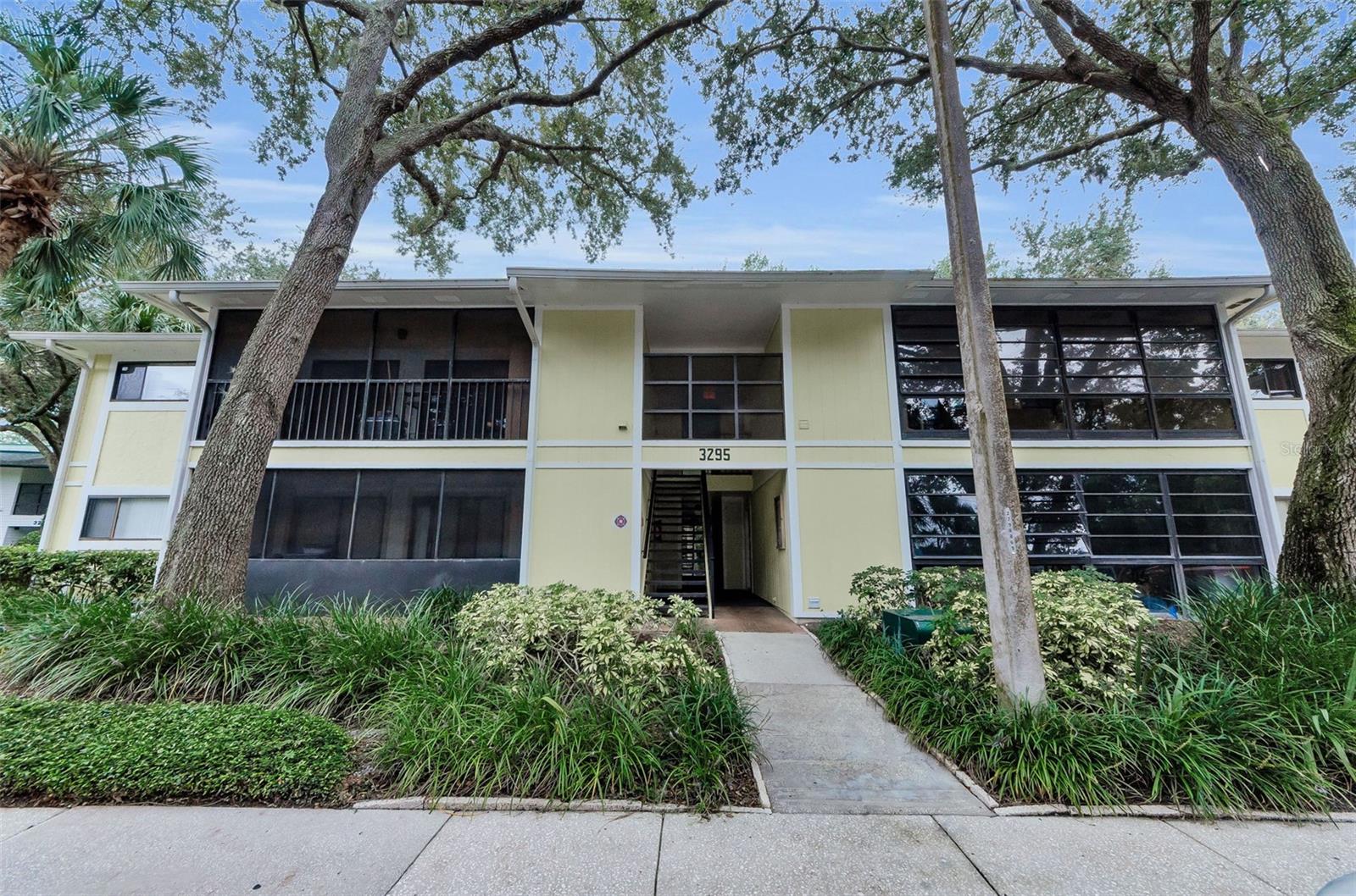 This awesome FIRST floor 2 Bedroom, 1 Bath condo is waiting for its new owner! This condo is conveniently tucked away near Innisbrook Golf Resort in this beautiful park like gated community. This unit offers an updated kitchen with solid surface countertops, stainless appliances and newer engineered hardwood floors throughout the home. Additional features are 2 spacious bedrooms, beautiful hall bath, and a nice lanai to relax on enjoying your morning cup of coffee! Light and Bright and awesome views of nature throughout the community! There is a laundry closet with a full-size washer and dryer so that you don't have to leave home to do your wash! Sellers have a home warranty in place thru June 2026! Fox Chase is conveniently located in Palm Harbor with access from US 19 or Belcher Rd (Belcher Rd is for Residents only), with plentiful amenities that include a heated pool, clubhouse, tennis courts, fitness center, shuffleboard, park and playground. Just outside the community is shopping and dining, Honeymoon state park beach is 15 minutes away and the famous Tarpon Springs Sponge Docks is close by too! You won't be disappointed seeing this spacious condo, so schedule your showing today!