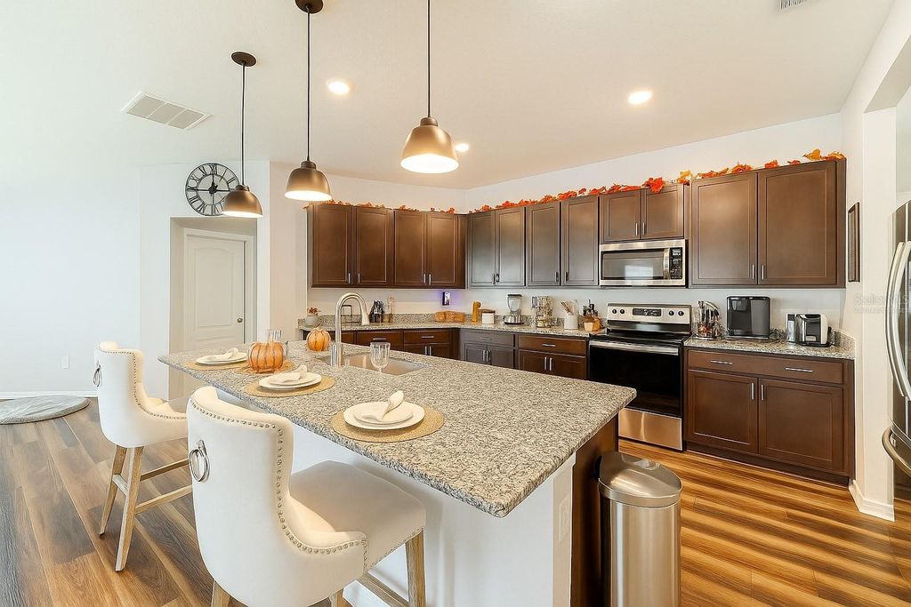 Photo of 522 Summer Grove Lane, Haines City, FL 33844 (MLS # A4671351)