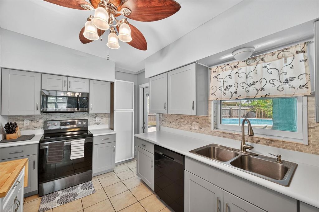 Photo of 8486 Pelican Lane, Seminole, FL 33777 (MLS # TB8431614)