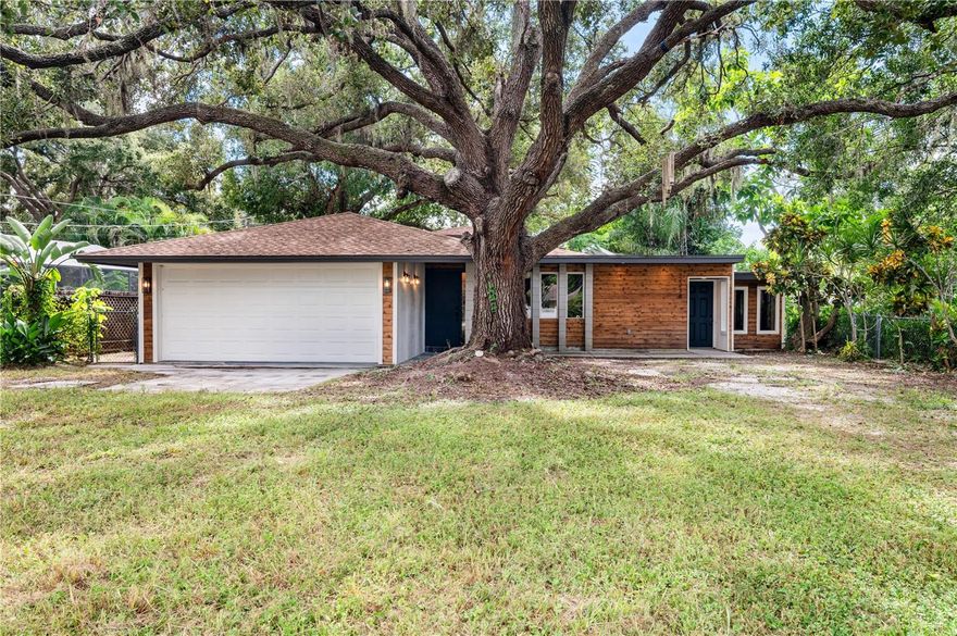 Welcome to 2231 Phillippi Street, your own private retreat in one of Sarasota’s most sought-after neighborhoods. This beautifully updated 3-bedroom, 2-bath home blends timeless comfort with modern design. Step inside to a light-filled open floor plan featuring luxury vinyl plank flooring, a spacious living area, and a seamless flow into the updated kitchen with hard-surface countertops, newer stainless appliances, and abundant storage.The primary suite offers a calm escape with an ensuite bath and ample closet space, while the guest bedrooms are perfectly sized for family or a home office. Outside, enjoy a large backyard with plenty of room for a pool, weekend gatherings, or quiet evenings under the trees. A two-car garage, fresh paint, and contemporary finishes throughout make this home truly move-in ready. Ideally located near top-rated schools, parks, shopping, dining, and just minutes to Sarasota’s world-famous beaches, this home offers the perfect blend of location, lifestyle, and livability. Whether you’re a first-time buyer, downsizing, or investing in the Florida lifestyle, 2231 Phillippi Street is the one you’ve been waiting for.
