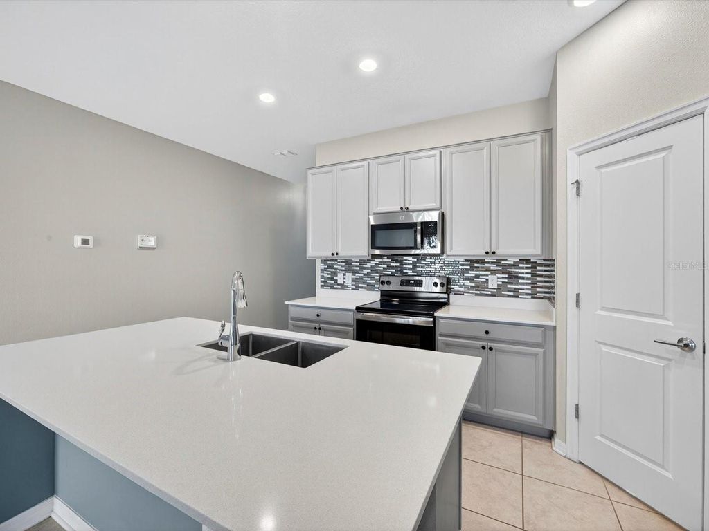 Photo of 1450 Lassen Street, Haines City, FL 33844 (MLS # O6346659)