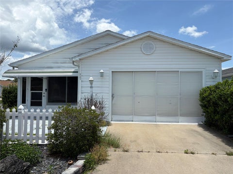 Photo of 731 Dumas Street, Lady Lake, FL 32159 (MLS # O6419120)