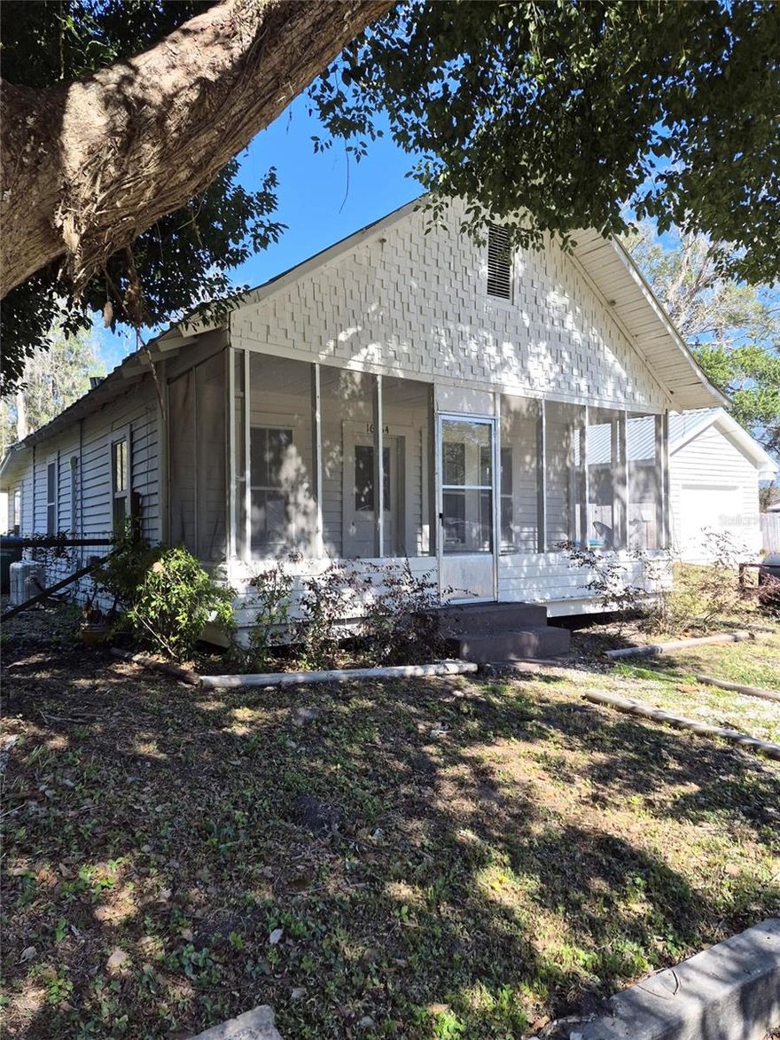CHARMING VINTAGE 2 BED home. Located in the quaint small town of ARCHER FL  mins to Gainesville, Newberry, & Williston! 20 min to Shands,VA hospitals, and UF. 35 mins to the (WEC) World Equestrian Center in Ocala. 
Updates includes granite counters in kitchen, updated cabinets, new plumbing, updated electrical 200amp, newer septic system. Laminate flooring throughout, energy efficient mini split unit, on demand tankless hot water heater. Large screened porch. Attic has potential of being finished for additional living space.
+ Large detached structure (12x20) with power...needs to be finished, would make a nice space for studio,in-law, adu,tiny house type of dwelling..the possibilities are endless. 
Great space for extended family members