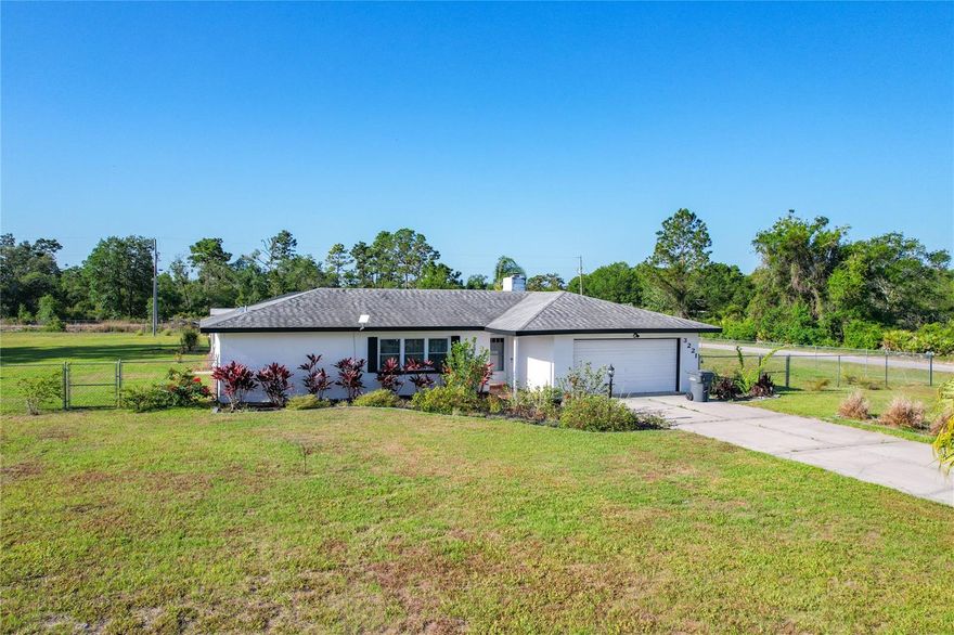 Amazing Pool home on 1 acre with complete outside kitchen by pool. Driveway parking for even very big trucks (See Photos of truck on drive) In Indian Lake Estates! A golf and lake community located in Central Florida.
This gorgeous home features 3 bedrooms 2 bathrooms and comes with all the bells and whistles! You will love the flow and feel of this home that has a split bedroom floor plan and open concept living! The kitchen
boasts gorgeous stone countertops, lots of cabinetry space stainless steel appliances, closet pantry and a handy island.  Check out the pool area with a second purpose made kitchen including cabinets etc This is perfect
for parties or simply family get togethers.  When you are not enjoying this beautiful home, Lake Walk In Water is just a 2-minute drive away where you can enjoy boating and fishing and magnificent sunsets while sitting
on the longest freshwater pier in Florida! Located about 20 miles east of Lake Wales, the community surrounds the 7,500 acre lake locally known as Lake Walk In Water, considered to be one of the best fishing lakes in
Florida and the largest lake in Polk County. The community has a beach, boat ramp, boat marina and pavilion. The pavilion comes complete with propane grills & covered picnic tables. Amenities include an 18 & 9-hole
golf course, basketball & tennis courts, playground, 23,000 sq.ft. clubhouse, cafe, post office, churches, library, fitness room & pro shop. If you love nature & the peace and quiet of the country, you're in luck. Deer,
raccoon, turkey, turtles, eagles, cranes & various species of birds abound! Orlando & Disney is about an hour's drive north & Tampa, Busch Gardens & the Gulf's pristine beaches a little over an hour west. Historic Bok
Tower, a National Landmark, is in nearby Lake Wales & the Westgate River Ranch Resort and Rodeo is just six miles away, an authentic Florida dude ranch and full-service resort offering guests the opportunity to
experience "Old Florida." Make your appointment today to see this exceptional home and see how great life can be at Indian Lake Estates! Polk County's best kept secret!