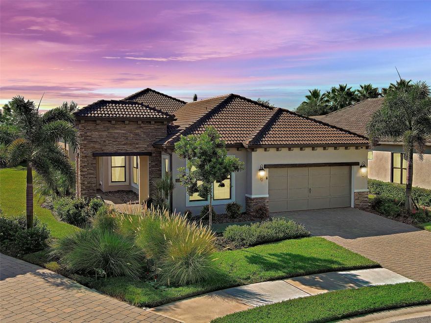 One or more photo(s) has been virtually staged. (ONLY OFFICE PHOTO IS VIRTUALLY STAGED) Welcome to ARIA in lovely Nokomis, Florida.  Developed by Neal Signature Homes.  A deed restricted, gated community with gorgeous resort style amenities including community CLUBHOUSE, FITNESS ROOM, POOL, SPA, PICKLEBALL and entertainment area that overlooks lake and fountain.   On-site community manager.  Presenting the Vicenzo Model.  SPARKLING CLEAN, MOVE-IN ready "MULTI-GENERATION HOME".  Built in 2022 with 2667 sq. ft., (heated and cooled) 3576 sq. ft. total.  3/Bedrooms, 3/Bathrooms, Flexi-Room/Office and 2-Car Garage.  BEING OFFERED FURNISHED.  Great room boasts 14 ft. ceilings, crown molding, ceramic tile flooring throughout most of the home (primary bedroom and guest bedroom have carpet). Push back the great room fully collapsing sliders and enjoy the 28ft. brick pavered lanai.  Kitchen includes custom pantry, quartz counters, gas cooktop, stainless appliances and ample cabinetry.  Larger center island with power has room for 4 bar stools.  Dining area adjacent to kitchen.  Nice sized Flexi/Bonus Room can be outfitted to fit your needs.  Would make an excellent office or sewing/craft room etc.  Primary Bedroom, En-Suite and Walk-In closets are a true trifecta!  Crown molding, room darkening shades, King Sleep Number Bed.  En-Suite sports granite, dual sinks, free standing tub and a HUGE shower.  HIS/HER closets are amazing, so big like having 2 more rooms.  Large 2nd bedroom has a walk-in closet and room darkening shades.  The 3rd bedroom begins the "MULTI GENERATIONAL APARTMENT. " This area boasts a bedroom with built-in closets that span one wall, custom bathroom, custom kitchenette with quartz counter and a family room.  Great area for guests, Mom and Dad, in-laws, college student or a live-in.  Privacy for all with its own PRIVATE ENTRANCE!  2 Car Garage has built-in storage, extra refrigerator/freezer and 2 ceiling storage units.  The entire home has IMPACT WINDOWS.  It is also a SMART home.  Exterior is a handsome combo of block with stone accents.  Lush landscaping/ mature plants and trees.  ARIA is located close to beaches, Venice Island, I-75, shopping, restaurants and the new Sarasota Memorial Hospital.  Make a great decision-come tour this home, IT IS ONE OF A KIND!