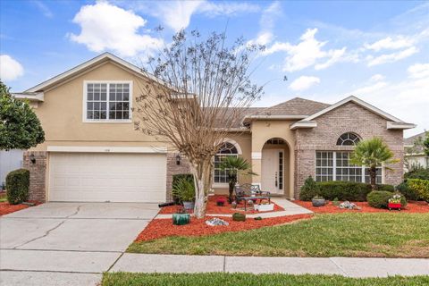 Photo of 106 Winghurst Boulevard, Orlando, FL 32828 (MLS # O6384530)