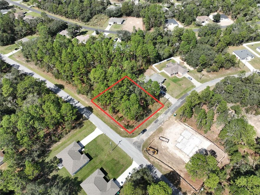 Build your dream home in the growing community of Citrus Springs! This 0.33-acre residential CORNER LOT is ready for your vision—zoned for single-family homes and offering city water, electricity at the front of the lot, and paved road access. Located in a quiet yet well-connected neighborhood, this lot provides an excellent opportunity for homeowners or investors alike. No HOA and no flood zone. Conveniently situated near shopping, schools, parks, golf courses, and just a short drive to the beautiful Crystal River. Don’t miss this prime piece of Florida real estate!