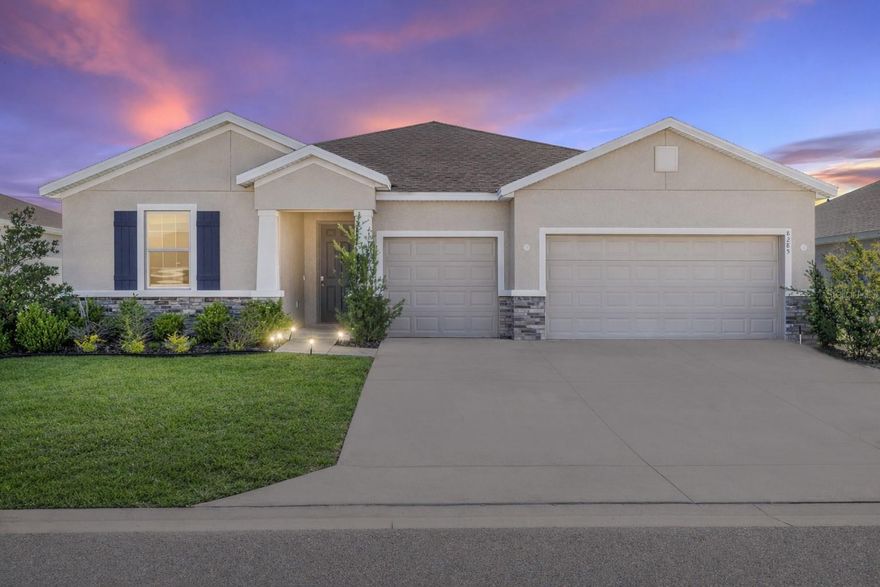 This 2,843-square-foot home in the Brookhaven community offers a practical and spacious layout with concrete block construction and a covered front porch entry. Inside, the open design features large windows that bring in plenty of natural light. Tray ceilings and a simple archway define the main living and dining areas. Tile flooring runs through the main living spaces, while all four bedrooms include carpeting for added comfort. The kitchen includes granite countertops, crown-molded cabinetry, stainless-steel appliances, a large island with a double sink, a walk-in pantry, and a breakfast nook. The primary suite is located just off the main living area and features a bathroom with a double vanity, soaking tub, walk-in shower, and separate water closet. This floor plan also includes a dedicated mother-in-law suite with its own kitchenette area complete with cabinets, offering a private and functional space for extended family or guests. A flexible bonus room can be used as a home office, gym, or playroom. Additional features include a mudroom leading to the two-car garage and an additional tandem golf cart garage. Sliding glass doors open to a screened-in lanai, providing a comfortable outdoor space to enjoy the Florida breeze.
Brookhaven offers community amenities including a pool, clubhouse, fitness center, playground, dog park, sidewalks, and street lighting. The community is golf-cart friendly and maintains common areas, recreation facilities, and trash service through low HOA fees.