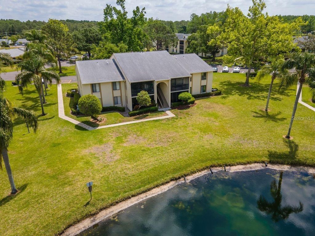 Photo of 1400 Pine Glen Lane #D1, Tarpon Springs, FL 34688 (MLS # TB8425110)