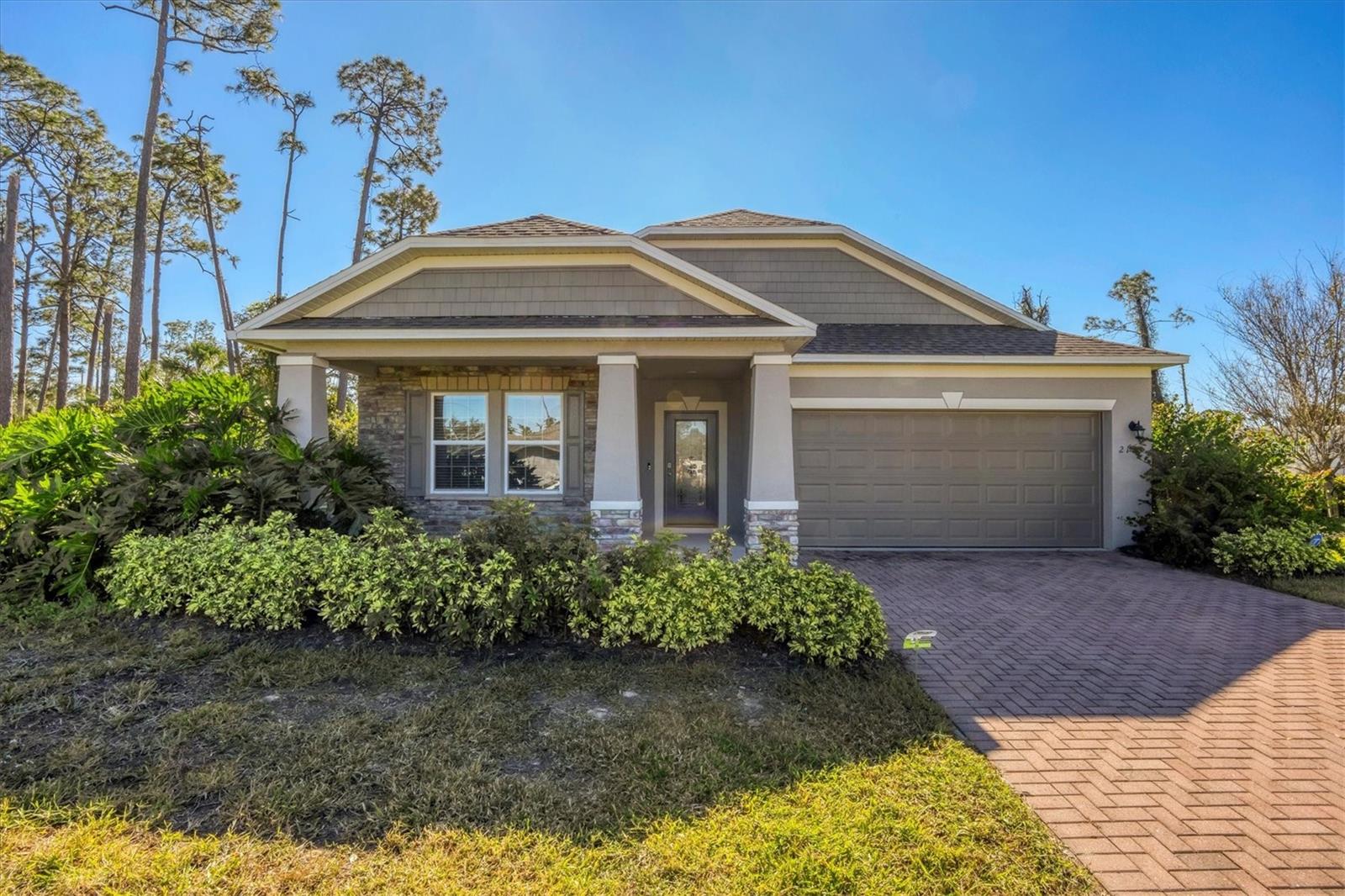 ENJOY this gorgeous 3/2 + DEN home with a 2-car finished garage, A/C & Heated. This split floor plan features 3 large bedrooms, 2 full bathrooms and a large private office/den. This is one of Maronda Homes most popular models the Hampton D3. Spacious open floor plan with eat in kitchen and center island, large great room, upgraded appliances, carpet and pad upgrade, blinds, lanai, hurricane shutters, and a well in place for irrigation sprinkler system. The stunning kitchen is perfect for entertaining as the island overlooks the living room. The kitchen offers a large pantry, granite countertops, stainless steel appliances, and a large deep sink. The primary suite is private and offers a large walk-in closet. Master BTH includes separate vanities, fully tiled walk-in shower, bathtub and a private toilet. Every room of the home is filled with natural light. This home offers a combination of comfort, style and functionality. Move right in this immaculate home, never owner occupied.