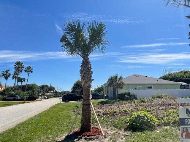 THIS BEAUTIFUL RESIDENTIAL LOT IS JUST ONE BLOCK FROM THE ATLANTIC OCEAN AND THE MOST GORGEOUS BEACHES IN THE WORLD! NEWLY CLEARED AND READY TO BUILD YOUR DREAM HOME! Located at Lighthouse Shores on Ponce Inlet at the southern tip of a barrier island between the Atlantic Ocean & the Halifax River, just south of Daytona Beach. Well-maintained quiet neighborhood, public utilities at site, corner lot & direct ocean/beach access just one block away! Take the Virtual tour #1 for a birds-eye view of Ponce Inlet! Virtual Tour #2 is a "stroll down the street" to the private walkway to the Atlantic! Close by are waterfront restaurants, marinas, nature trails and all in an OCEANFRONT community! Volusia County has a rich history which includes early Spanish exploration, colonial land grants to colorful locals, sugar plantations, the Seminole Wars & the fascinating building of the Ponce Inlet Lighthouse (located nearby). Come build your dream home in PARADISE!!
