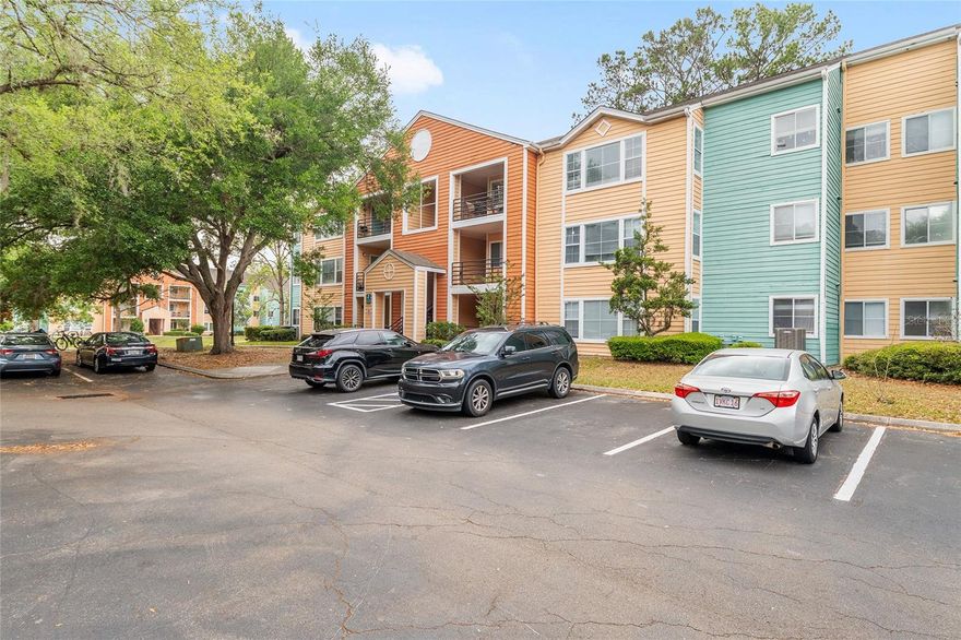 RENOVATED top floor 4 bed furnished condo near the University of Florida, UF Health Shands Hospital, and shopping! This third-floor unit features vaulted ceilings in the living room and luxury vinyl plank flooring throughout – no carpet! The renovated kitchen is highlighted by quartz countertops and island, backsplash, stainless steel appliances, and upgraded cabinetry. Bathrooms have been thoughtfully updated with modern vanities and renovated showers. Each spacious bedroom offers a built-in desk and large closet, and the bathrooms feature dual sinks for added convenience. Enjoy community amenities including a pool, fitness center, basketball court, and volleyball court. Internet and cable are included in the HOA fee. Located on bus routes to UF for added convenience. Ideally located close to UF campus, UF Health Shands Hospital, and shopping, this furnished condo offers a great combination of updates, layout, and location!