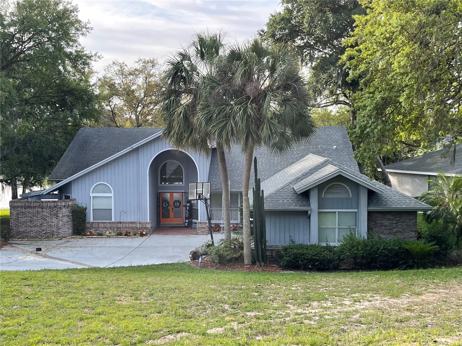 Welcome home to the stunning Lake Francis in Apopka. This exquisite single-story residence, gracefully perched on the serene shores of Lake Francis, is the oasis you’ve been dreaming of. This home offers unparalleled flexibility. As you step through the front door, you are welcomed by soaring vaulted ceilings and an awe-inspiring view of the tranquil lake. The expansive patio, perfect for unwinding or hosting memorable gatherings, invites you to savor the beauty of your surroundings. Each room is generously sized, providing ample space for relaxation and creativity, while the modern kitchen boasts top-of-the-line stainless steel appliances, ensuring both style and functionality. This Lake Francis gem is ready to become your personal haven.