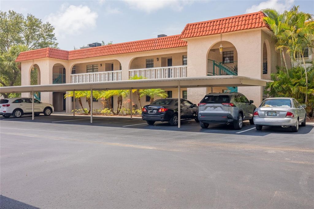 Photo of 1753 Belleair Forest Drive #D7, Belleair, FL 33756 (MLS # TB8478789)