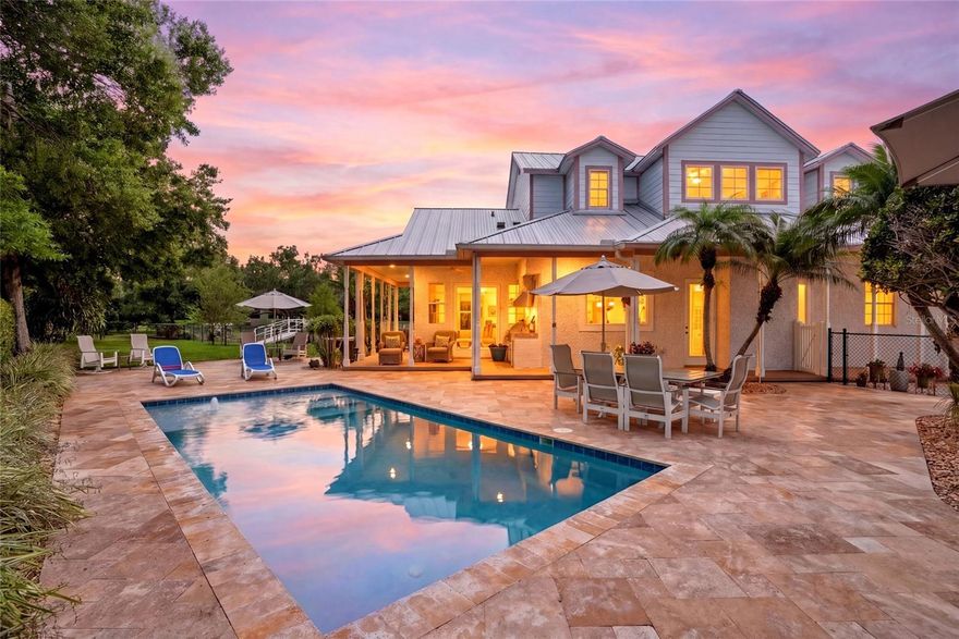 Stunning Estate with Guest Apartment & Resort-Style Pool
This exceptional 5-bedroom, 4.5-bath home offers space, flexibility, and premium upgrades throughout. Featuring a durable metal roof and a detached 3-car garage with a private mother-in-law apartment above, this property is perfect for multi-generational living or added income potential.
Step outside to your own private oasis—complete with a beautiful travertine-paved pool deck and a cool-touch pool finish, ideal for enjoying Florida living year-round.
Inside, you’ll find expansive living areas designed for comfort and functionality. The spacious downstairs primary suite provides privacy and convenience, while the generous layout offers endless possibilities for hobbies, workspaces, or entertaining.
Situated on a large lot with plenty of room to spread out, yet conveniently located near restaurants, shopping, and everyday essentials—this home truly delivers the best of both space and accessibility.