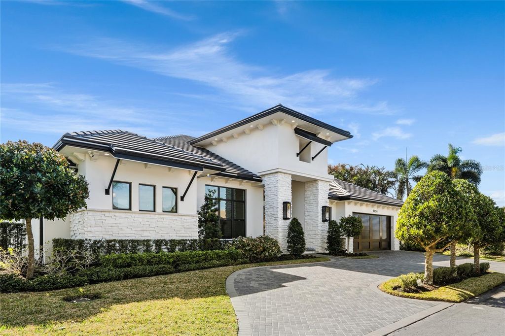 Photo of 9058 SE Star Island Way, Hobe Sound, FL 33455 (MLS # O6380896)