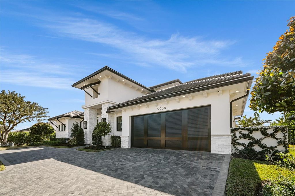 Photo of 9058 SE Star Island Way, Hobe Sound, FL 33455 (MLS # O6380896)