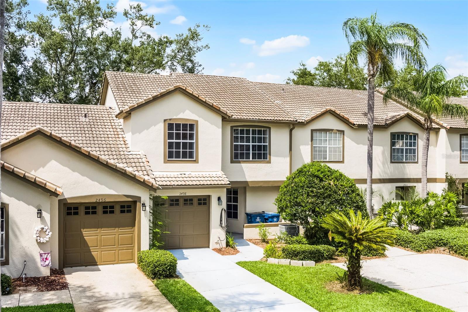 Welcome home to your 3-bedroom 2.5-bathroom TOWNHOME in the MAN-GATED GOLF COURSE COMMUNITY of Southern Dunes Golf and Country Club! Step into the SPACIOUS great room and take in the PANORAMIC view of the SCREENED in LANAI overlooking the GOLF COURSE with a HIGH CEILING, dining area, and GOURMET kitchen that features QUARTZ counter tops, stainless steel appliances, plenty of cabinet space with CROWN MOLDING and a breakfast bar. Upstairs, the Primary Suite includes a luxurious bathroom with QUARTZ countertop, tile shower and walk-in closet. This property also features BRAND-NEW INTERIOR PAINTING (2025), BRAND-NEW STAINLESS-STEEL DISHWASHER (2025), BRAND-NEW QUARTZ COUNTERTOPS IN KITCHEN & PRIMARY BATHROOM (2025), BRAND-NEW VANITIES IN ALL 3 BATHROOMS WITH LIGHTING (2025), BRAND-NEW CABINETRY WITH CROWN MOLDING IN KITCHEN (2025), BRAND-NEW TILED SHOWER IN PRIMARY BATHROOM (2025) and NEWER A/C UNIT (2024). Southern Dunes Golf & Country Club features a man-guard gated entrance that brings resort-style living to Haines City with amazing amenities such as heated lap pool and resort-style pool, a true golfing experience that offers 18 holes of remarkable golf, playground, lighted tennis courts, lighted basketball courts, library, card room, and on-site restaurant that features LIVE MUSIC on some weekends. This community is located just off 27 and a few minutes' drive to Posner Village Shopping Mall, Cinepolis Luxury Cinemas IMAX Polk, top-rated dining options, AdventHealth Heart of Florida HOSPITAL, and Interstate 4, this home combines convenience with quality living. Don't miss your opportunity to lease this move-in-ready gem in a prime location schedule your private tour today!