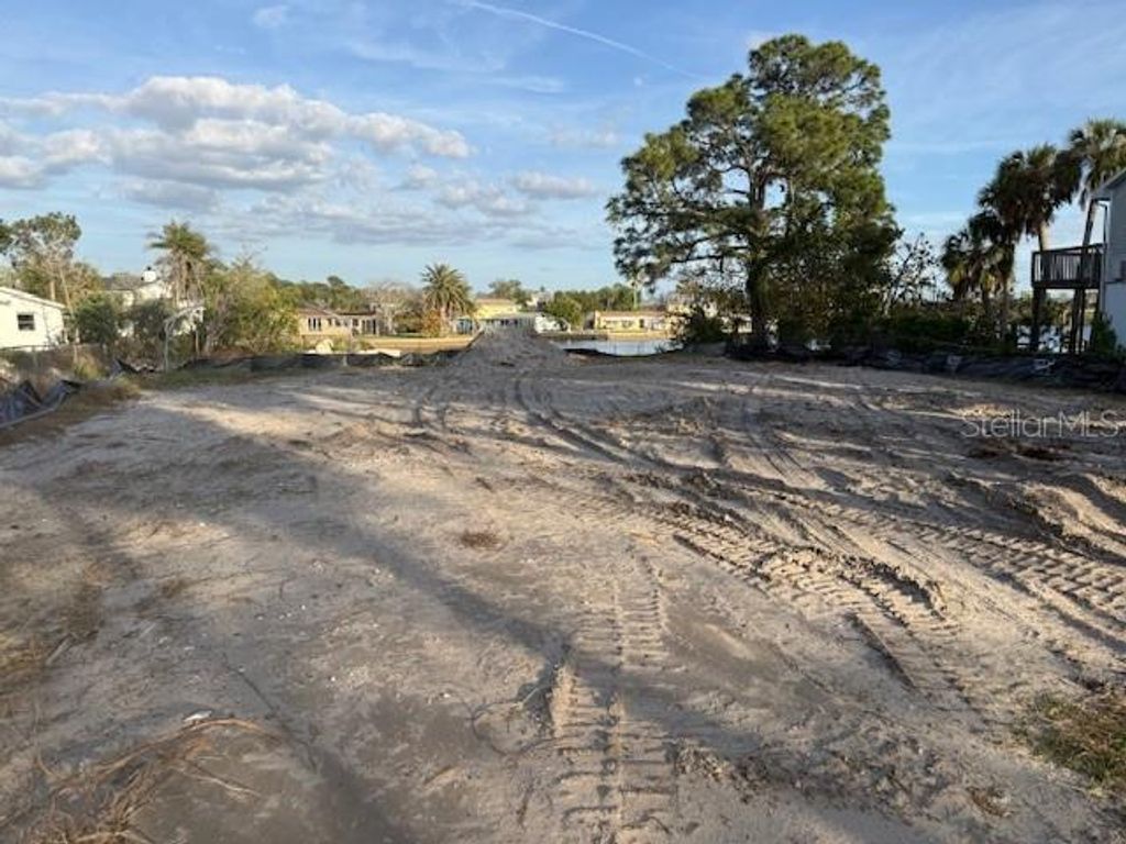 Photo of 5250 Miller Bayou Drive, Port Richey, FL 34668 (MLS # W7884856)