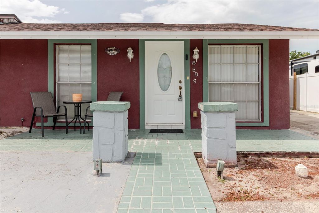 Photo of 8589 Briar Grove Circle, Tampa, FL 33615 (MLS # TB8409243)