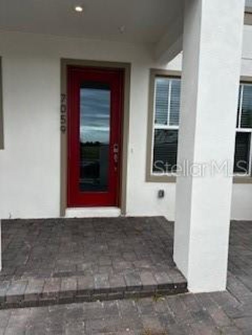 Be a part of one of the most sought-after communities - Laureate Park!! Come see this beautiful, brand new, never lived-in, townhome with 3 bedrooms, 2.5 bathrooms, 2 car attached garage and a grand balcony overlooking a beautiful lake and stunning sunsets. The kitchen is loaded with beautiful upgraded finishes and brand new appliances.  Unit includes washer and dryer.  Walking distance to the VA and Nemours hospital, BOXI park, play area and endless trails.  Minutes away from 417, 528, and Orlando International Airport.  Excellent schools and a great location.  Don't miss this opportunity!!