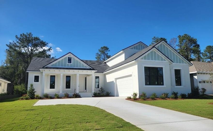 One or more photo(s) has been virtually staged. Pre-Construction. To be built. Pre-construction. To be built. Located in the gated Southern Hills Plantation Club, this new Coastal Pointe home offers modern design, quality craftsmanship, and a peaceful golf-course setting. The open-concept layout features high ceilings, great natural light, and a seamless flow from the kitchen to the main living areas, perfect for everyday living or entertaining. Step out to your front porch and enjoy the views of rolling greens, mature oaks, and the natural beauty that surrounds the community. Whether you’re relaxing with morning coffee or unwinding in the evening, this home delivers comfort, style, and the Southern Hills lifestyle.