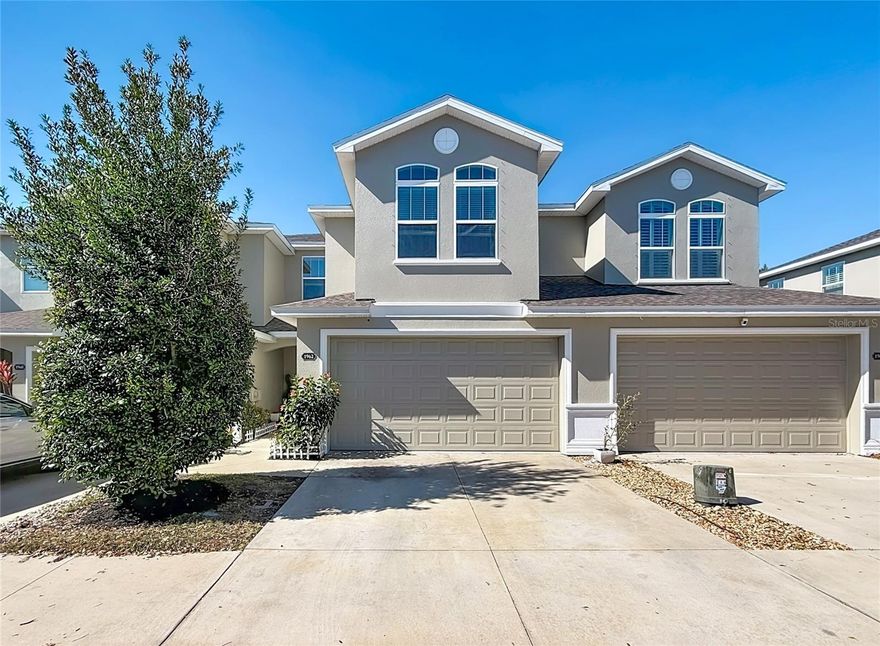 Come see this beautiful, light-filled townhome with a spacious open floor plan and soaring 9.5-foot ceilings. A wall of pocketing sliding glass doors opens wide to a screened lanai, creating an airy indoor-outdoor flow with tranquil pond views and stunning sunset backdrops.
Quality construction, paired with meticulous ownership and tasteful upgrades, make this home truly stand out. The kitchen features soft-close wood cabinetry, granite countertops, stainless steel appliances, a closet pantry, and an oversized breakfast bar open to the living and dining areas. A two-car garage with extra shelving and additional interior storage add everyday convenience. The renovated powder bath showcases wainscoting, an upgraded vanity, and a one-piece toilet.
Fresh neutral paint throughout, new luxury vinyl flooring downstairs, and plush carpet upstairs make living easy. All bedrooms and the laundry are located upstairs, with 9-foot ceilings throughout. The spacious primary suite offers pond views, a walk-in closet, and an ensuite bath with double sinks, a spa-like walk-in shower, and linen storage. A generous middle bedroom—currently used as a home office—easily accommodates a complete bedroom suite. The third bedroom, also generously sized, features decorative arched windows and a walk-in closet, and the secondary bedrooms share a well-appointed full bath.
Energy-efficient features include dual-zone A/C, Low-E windows, and Energy Star appliances. Located in the gated Montclair Lake Townhomes community, residents enjoy low HOA fees covering High speed internet, expanded cable, exterior painting /maintenance, roof repairs /replacement,  community pool, landscaping, irrigation, pond care, and healthy escrow reserves.
Centrally located in Clearwater near shopping, dining, and medical facilities, with easy access to Gulf beaches, Dunedin, Safety Harbor, and Tampa International Airport. This is the home you’ve been waiting for!