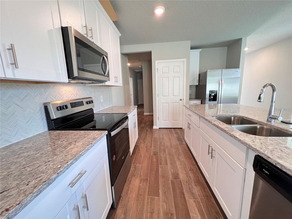 Photo of 981 Rivers Crossing Street, Clermont, FL 34714 (MLS # O6398439)