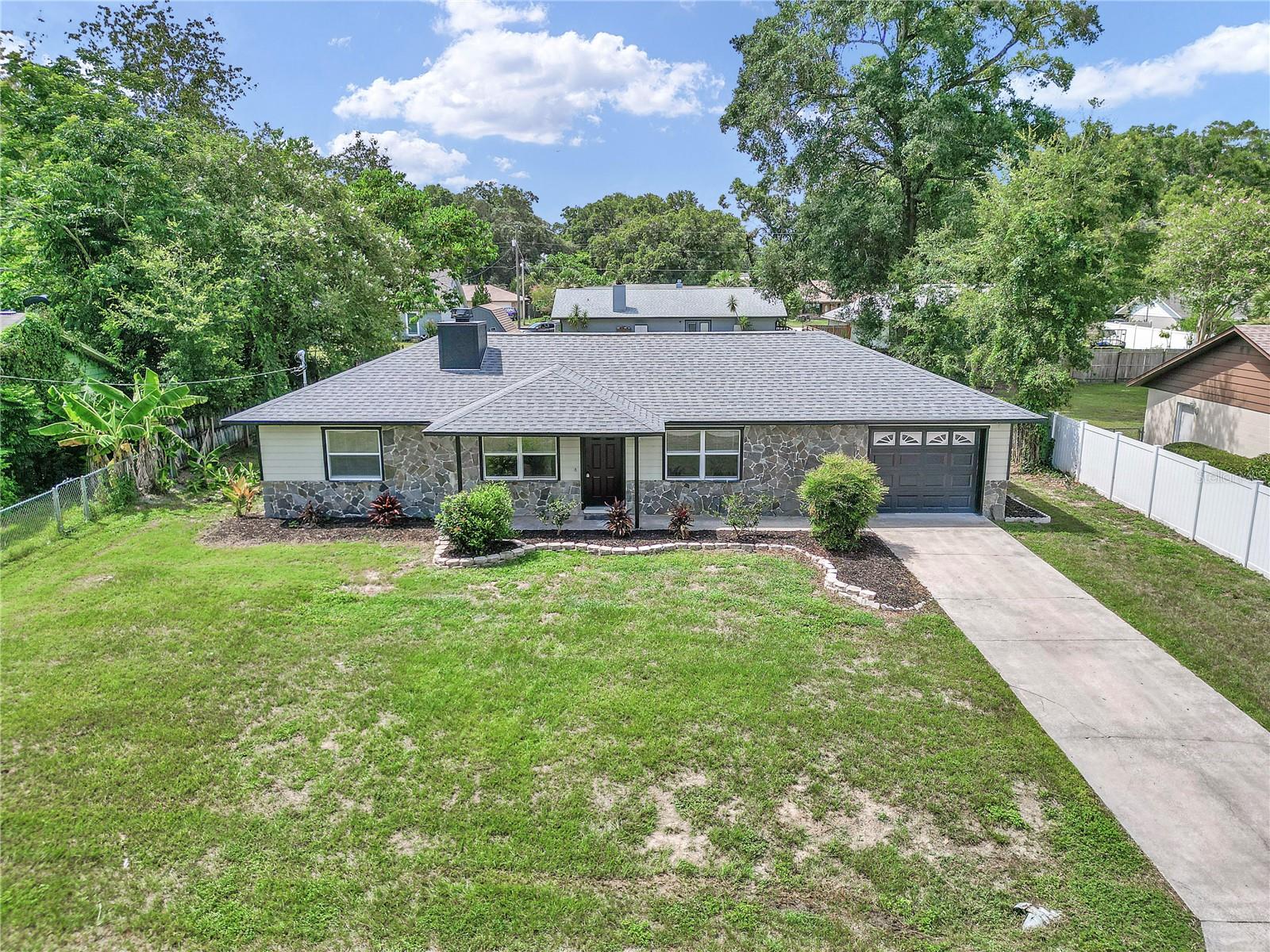 Charming updated 3 bedroom, 2 bathroom property in NE Ocala. Recent updates include Roof(2025), fresh interior/exterior paint, new carpet in bedrooms and LVP in living room, and updating landscaping. The kitchen offers new cabinets, countertops, and backsplash. There are new window treatments throughout, all new electrical outlets, and all new plumbing connections. The garage floor has a fresh epoxy finish, and the chimney was rebuilt with Hardie board. This property is located just minutes from groceries, shopping and downtown Ocala, with quick access to highway 40 and I-75, and only 25 min from the World Equestrian Center. Come take a look today!