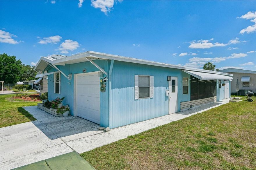 Discover the charm of this totally remodeled mobile home situated in Wesley Chapel. Nestled on a spacious lot, this property
has a comfortable living space with two bedrooms and 1.5 bathrooms. The open floor plan includes a light-filled living area and a well-appointed kitchen, appropriate for daily living and entertaining. Also has a nice florida room to relax in. A rare one car garage aling with a golf cart shed. Enjoy the tranquil outdoor space that surrounds the home, providing a superb setting for relaxation. Conveniently located near local amenities and major roadways. Don't miss out on this opportunity!