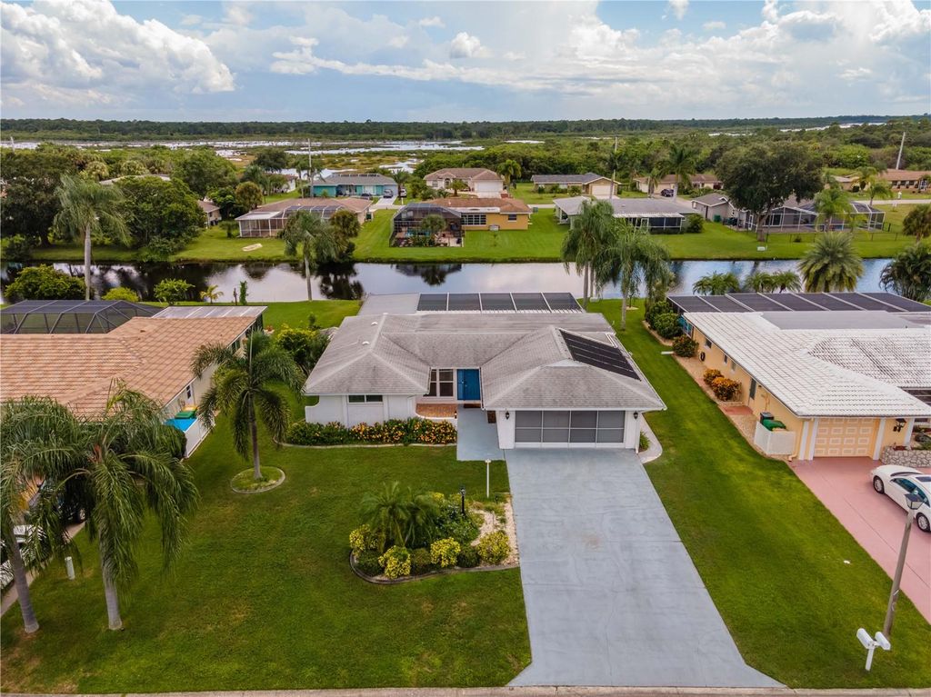 Photo of 33 Caddy Road, Rotonda West, FL 33947 (MLS # A4673763)