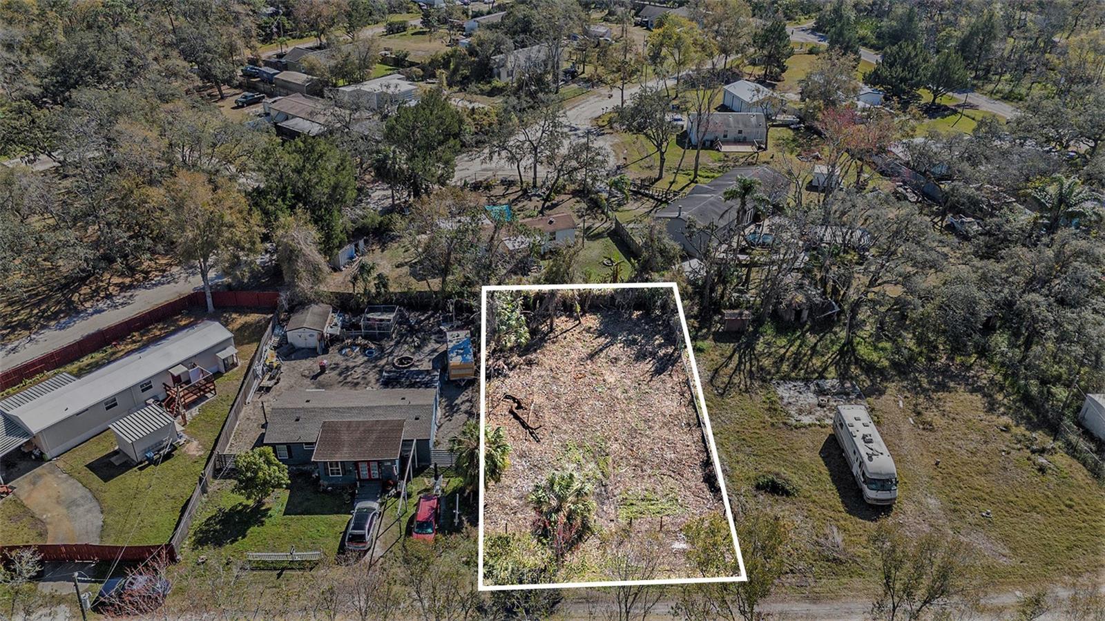 Whether you're looking to build, invest, or simply escape, this CLEARED LOT offers endless possibilities. No HOA OR CDD fees and a laid-back atmosphere make Moon Lake Estates an increasingly popular choice for families, retirees, and investors alike. Just minutes away from major highways, shopping, dining, schools, and recreational activities. Enjoy nearby Moon Lake Park, featuring a lake, picnic areas, fishing, and boat ramp access for outdoor enthusiasts.