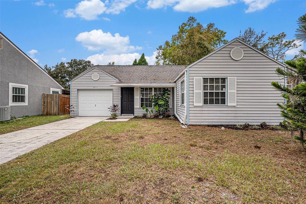 Photo of 8214 Riverboat Drive, Tampa, FL 33637 (MLS # O6357354)