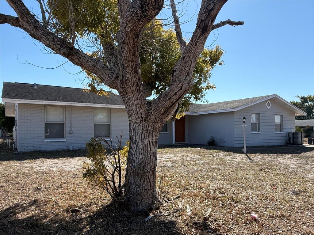 Photo of 7734 Tropicana Drive, Port Richey, FL 34668 (MLS # TB8477932)