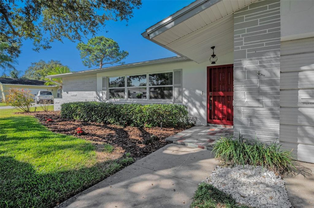 Photo of 2150 Sarazen Drive, Dunedin, FL 34698 (MLS # TB8439959)