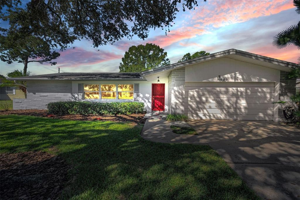Photo of 2150 Sarazen Drive, Dunedin, FL 34698 (MLS # TB8439959)