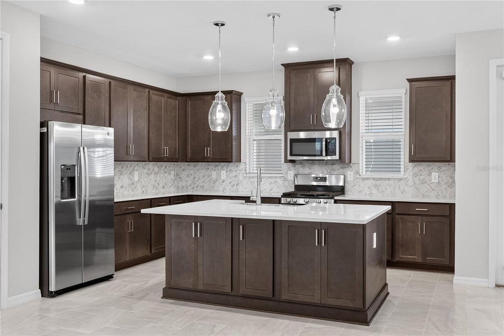 Photo of 5162 Dominion Alley, Saint Cloud, FL 34771 (MLS # O6427876)