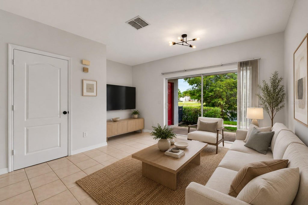 Photo of 10825 Savannah Wood Dr #199, Orlando, FL 32832 (MLS # O6432062)