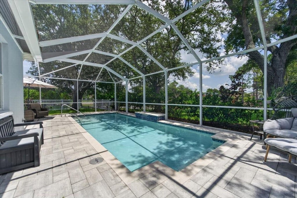 Photo of 12326 Winding Woods Way, Bradenton, FL 34202 (MLS # TB8523839)