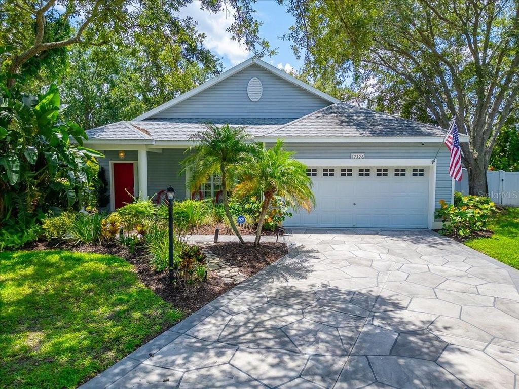 Photo of 12326 Winding Woods Way, Bradenton, FL 34202 (MLS # TB8523839)