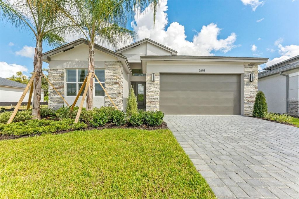 Photo of 3698 Malta Avenue, Wesley Chapel, FL 33543 (MLS # TB8432320)