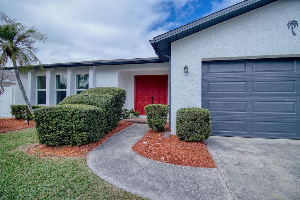 Photo of 1496 Seaspray Lane, Dunedin, FL 34698 (MLS # TB8453511)